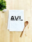 a kitchen towel with the word avl printed on it next to a wooden spoon