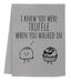 a tea towel with a cartoon of a cupcake and a monster saying i knew