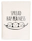 a dish towel with three peas on it